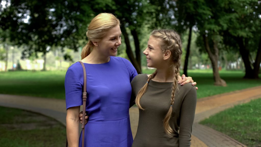 walking her confident, teen daughter to college